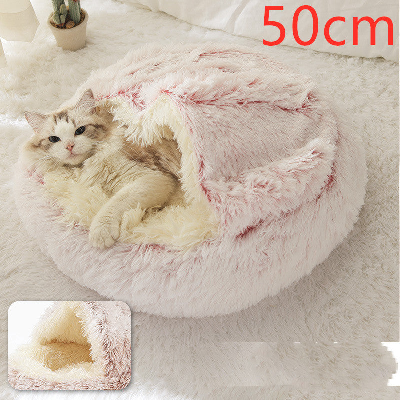 Cat lounging in a round, plush, pink and cream 2-in-1 pet bed, perfect for winter warmth, 50cm size from Pet La'Fleur.