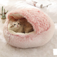 Cat cozy in round plush winter pet bed by Pet La'Fleur